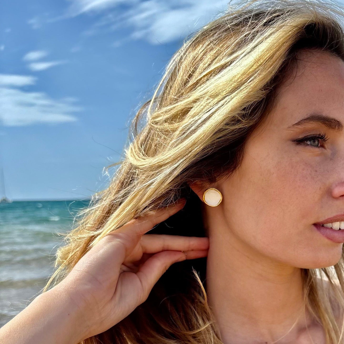 Camelia | Handcrafted white ceramic stud earrings with gold luster